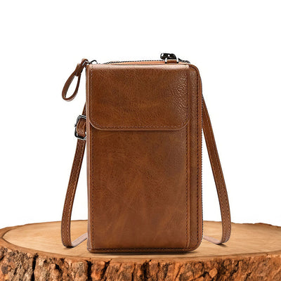 ニコールのファッショナブルでコンパクトなハンドバッグ